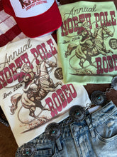 Load image into Gallery viewer, Annual North Pole Rodeo Graphic Tee