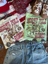 Load image into Gallery viewer, Annual North Pole Rodeo Graphic Tee