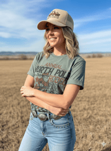 Load image into Gallery viewer, Reindeer North Pole Rodeo Graphic Tee
