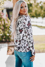 Load image into Gallery viewer, Cow Print Keyhole Long Sleeve Top