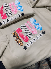 Load image into Gallery viewer, Jesus Saves Graphic Sweatshirt | Christian Crewneck | Leopard Zebra Pink Polka Dot Jesus Sweater
