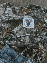 Load image into Gallery viewer, Upcycled Coors Banquet Rodeo Realtree Camo Rework (One-of-One) | Size XL Shirt
