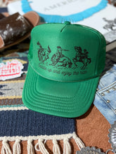 Load image into Gallery viewer, Saddle Up And Enjoy The Ride Trucker Hat

