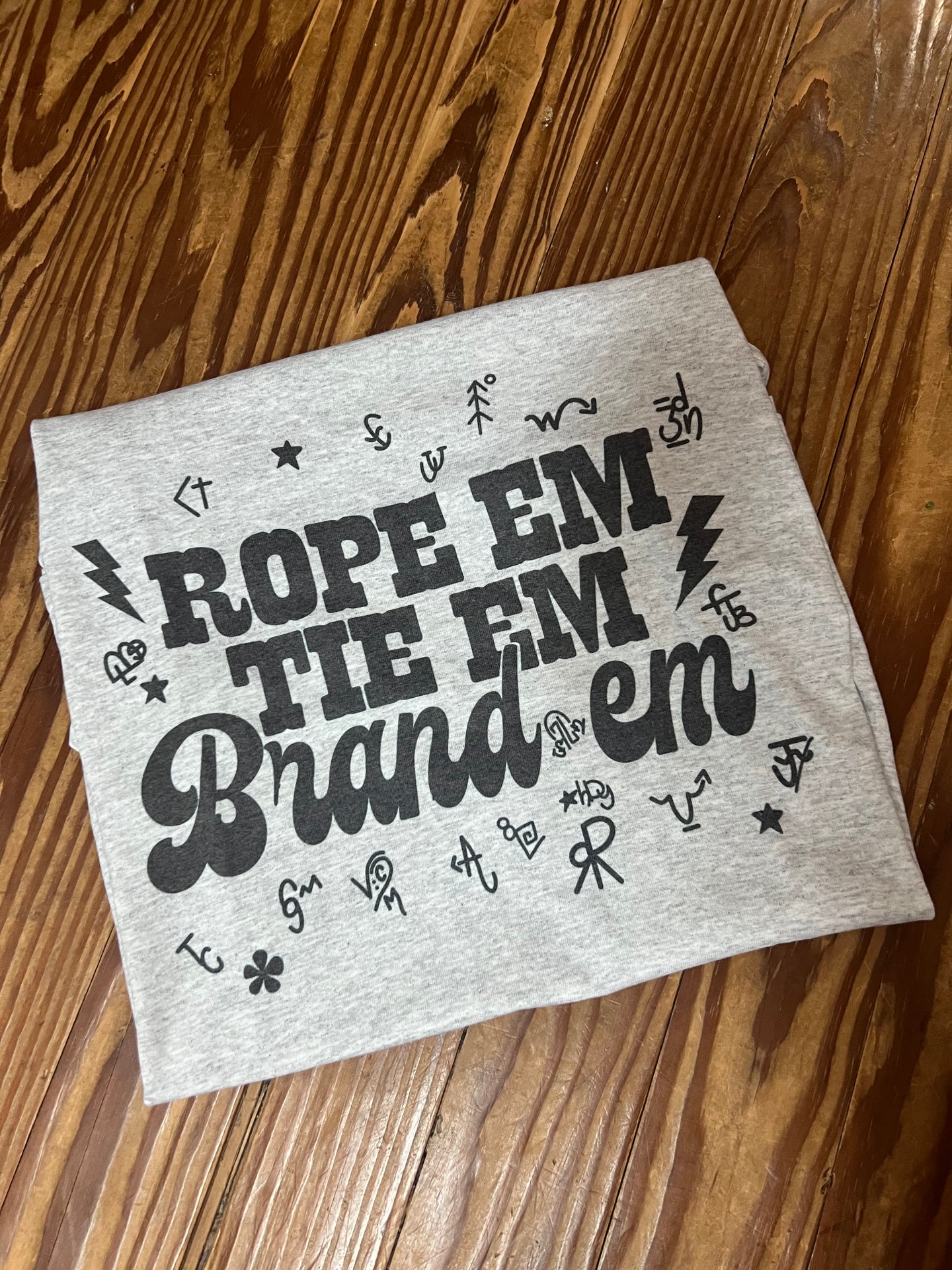 Rope 'em Tie 'em Brand 'em