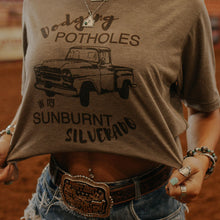 Load image into Gallery viewer, Dodging Potholes Graphic Tee
