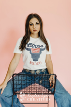 Load image into Gallery viewer, Coors Rodeo White Graphic Shirt – Graphic Tee, Long Sleeve &amp; Crewneck (Copy)
