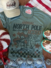 Load image into Gallery viewer, Reindeer North Pole Rodeo Graphic Tee
