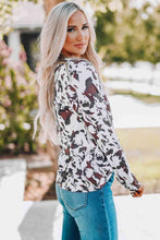 Load image into Gallery viewer, Cow Print Keyhole Long Sleeve Top
